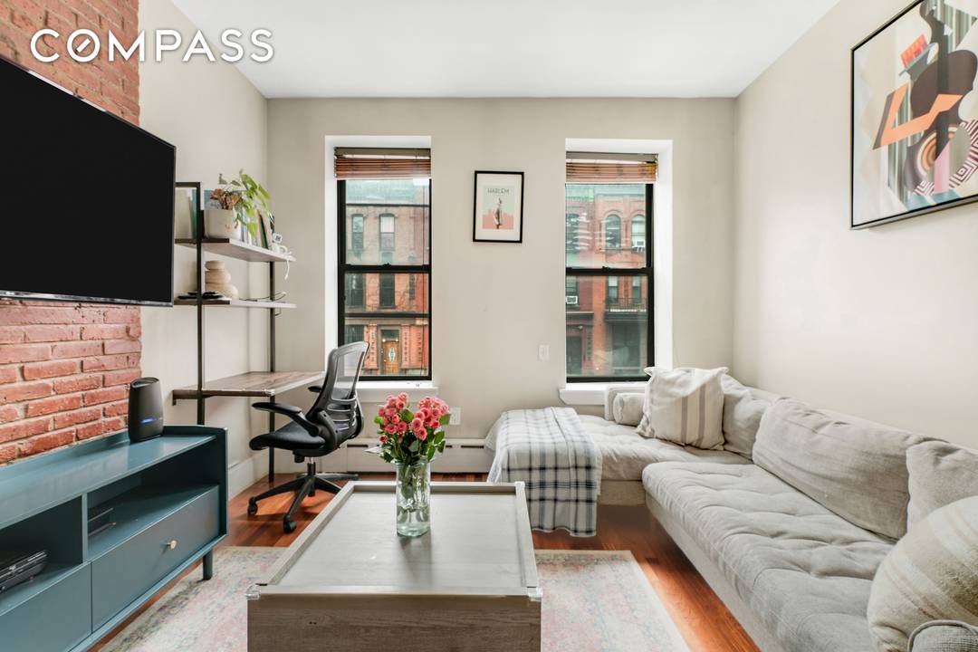 Located just one flight up, this bright, sun filled two bedroom home with southern exposure offers an exceptional combination of light, space, and convenience.