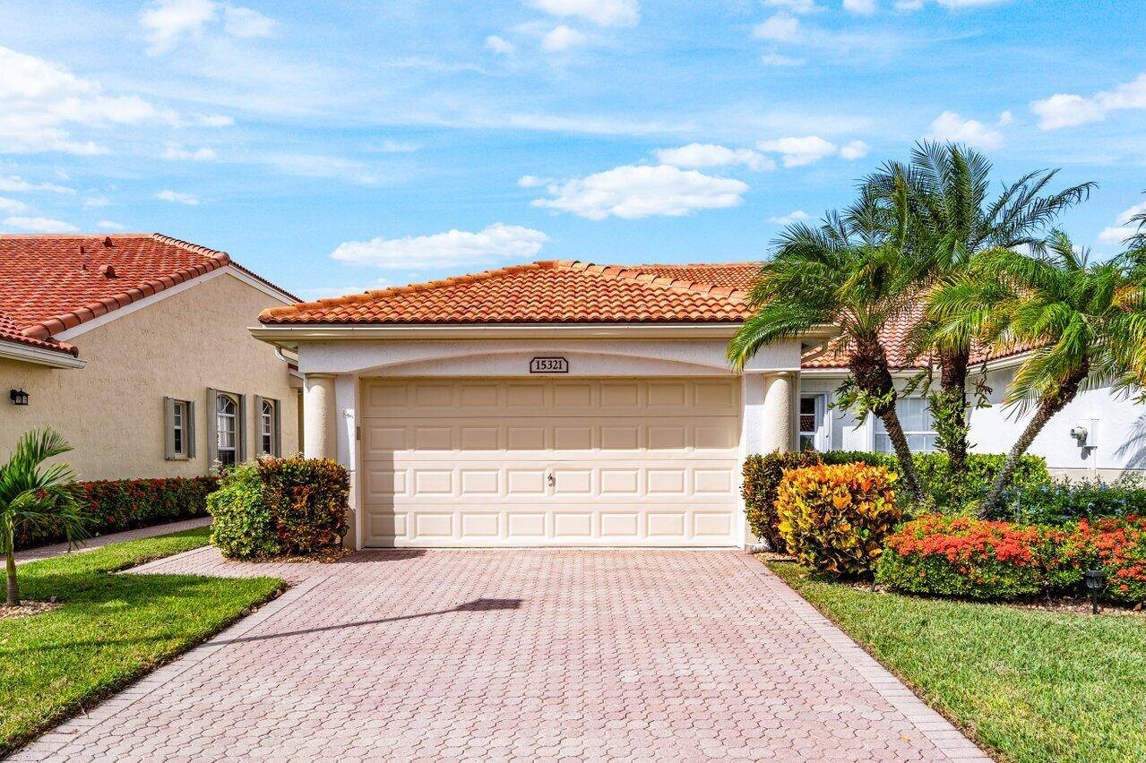 You are going to fall in love with this stunning 2 bedroom, 2 bath, lakefront villa in the highly sought after Floral Lakes community !