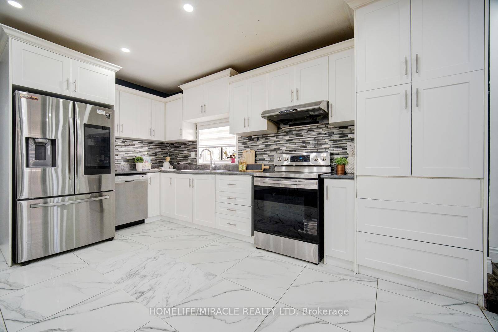 Welcome to this stunning, fully renovated 3 bedroom detached bungalow nestled in a quiet and family friendly neighborhood.