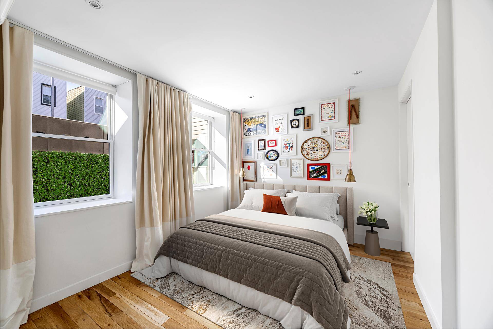 Welcome home to this mint condition townhouse with abundant natural light in the heart of Williamsburg.