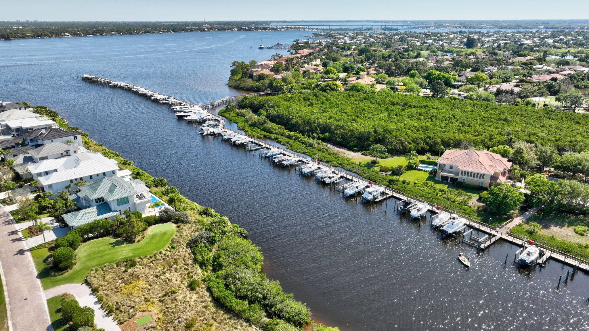 OCEAN ACCESS ! ! ! Nestled in the prestigious gated community of Palm Cove, this stunning townhouse offers breathtaking views of Bessey Creek and the Saint Lucie River.