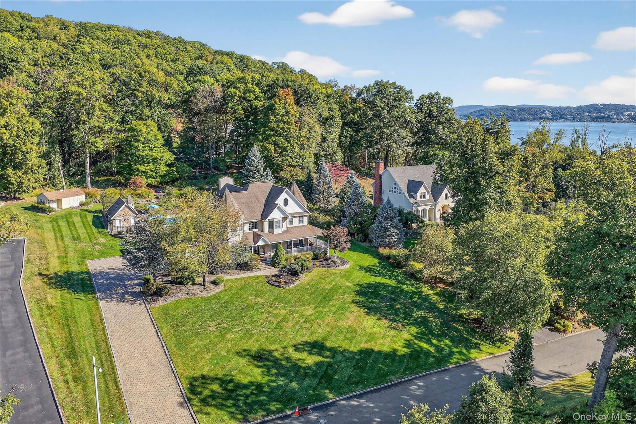 Sitting high on an acre just two blocks from the Hudson River, discover this absolutely stunning Center Hall Colonial boasting over 3, 500 square feet of living space across two ...