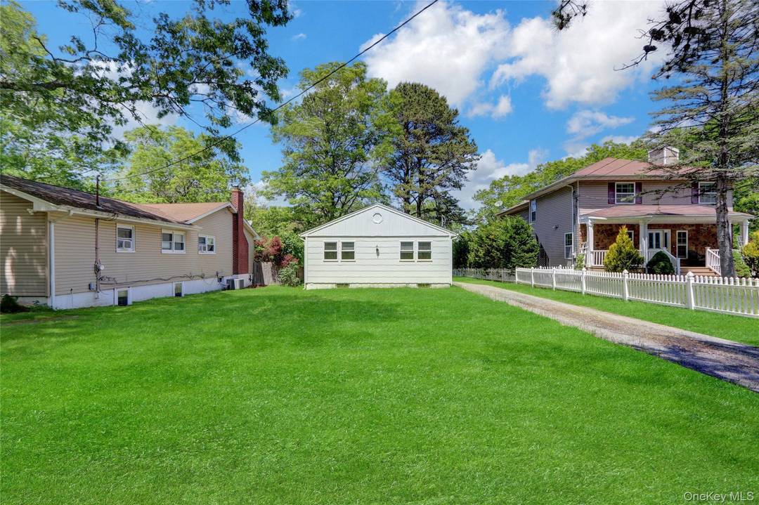 Peconic Lake, Waterfront, Ranch style home, with full basement, updated kitchen w quartz counter and stainless steel appliances, updated bathroom, updated refurbished flooring, new carpeting, fresh paint, etc.