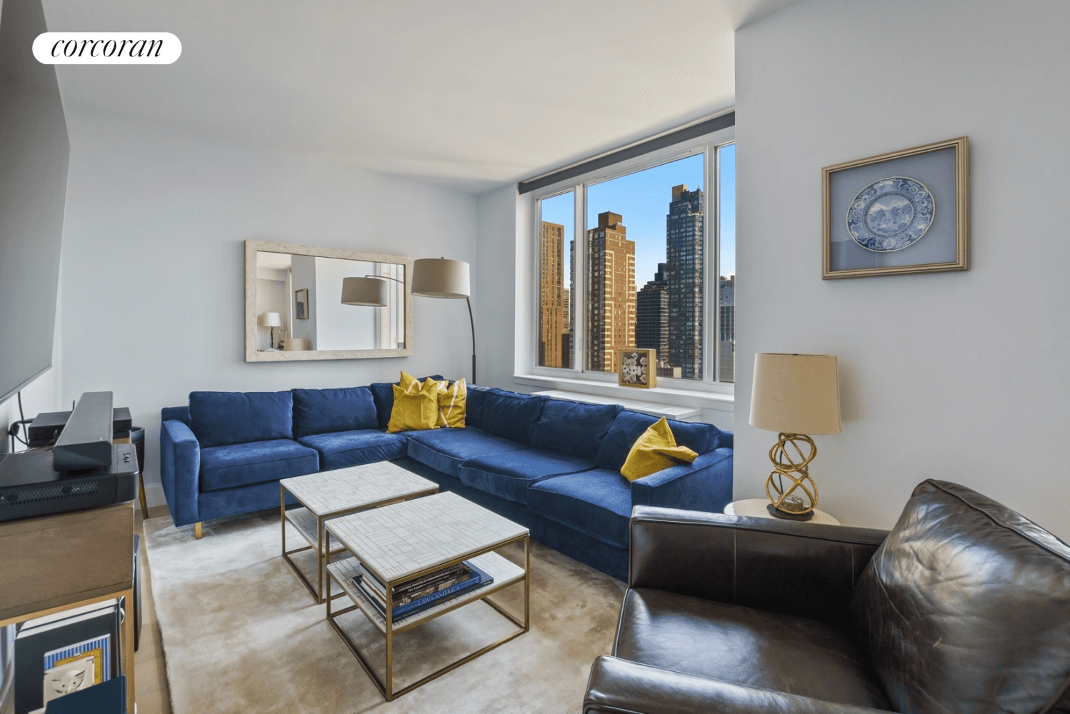 This bright Upper East Side one bedroom plus den home office with in unit washer dryer and sweeping city views is a fabulous place to call home !