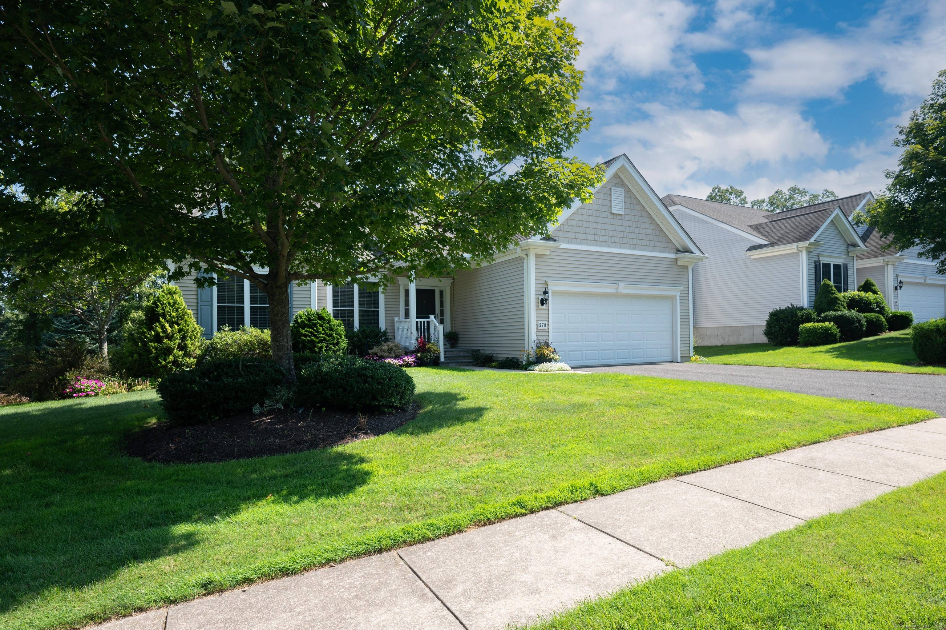Great open floor plan Adler model on 4th fairway at Oxford Greens Golf Course.