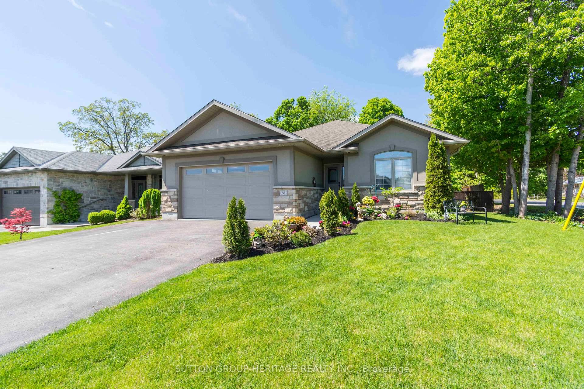 Welcome to this beautifully maintained, open concept 4 bedroom brick bungalow, ideally located on a quiet crescent at the edge of town offering privacy, comfort and exceptional indoor outdoor living ...