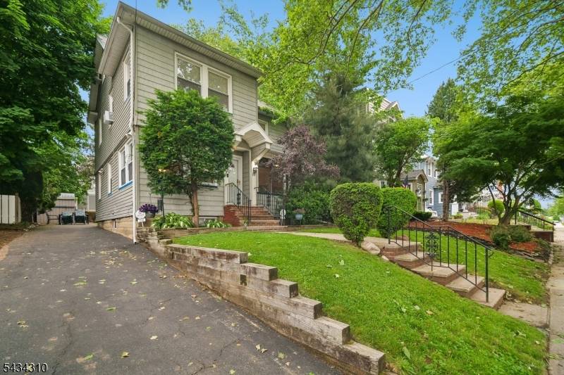 Timeless ! Elegant, Custom Center Hall Colonial Offering Three Levels Of Finished, Functional Living Space Filled With Tons Of Natural Sunlight Throughout !