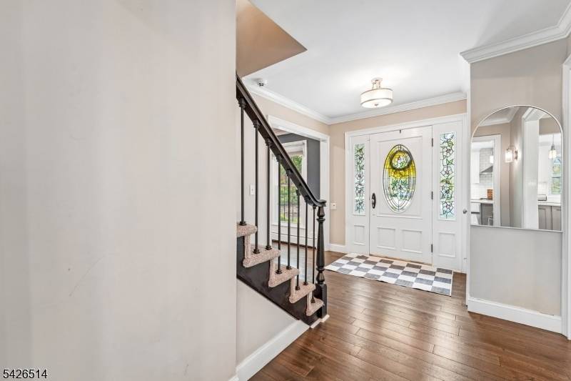 Experience the feeling of being on vacation every day in this stunning, fully updated 4 bedroom, 3.
