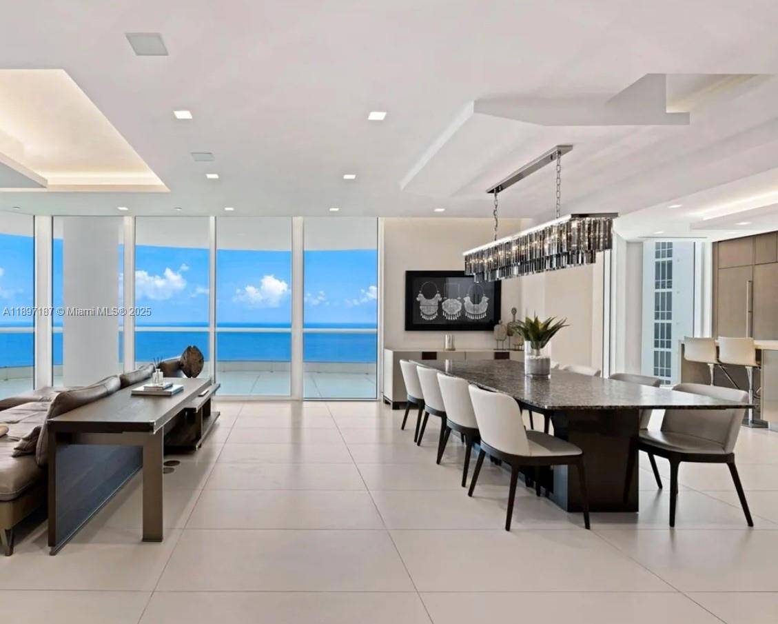 Live the essence of refined coastal luxury in this exquisite 4 bedroom residence with a maid s quarter and 6.