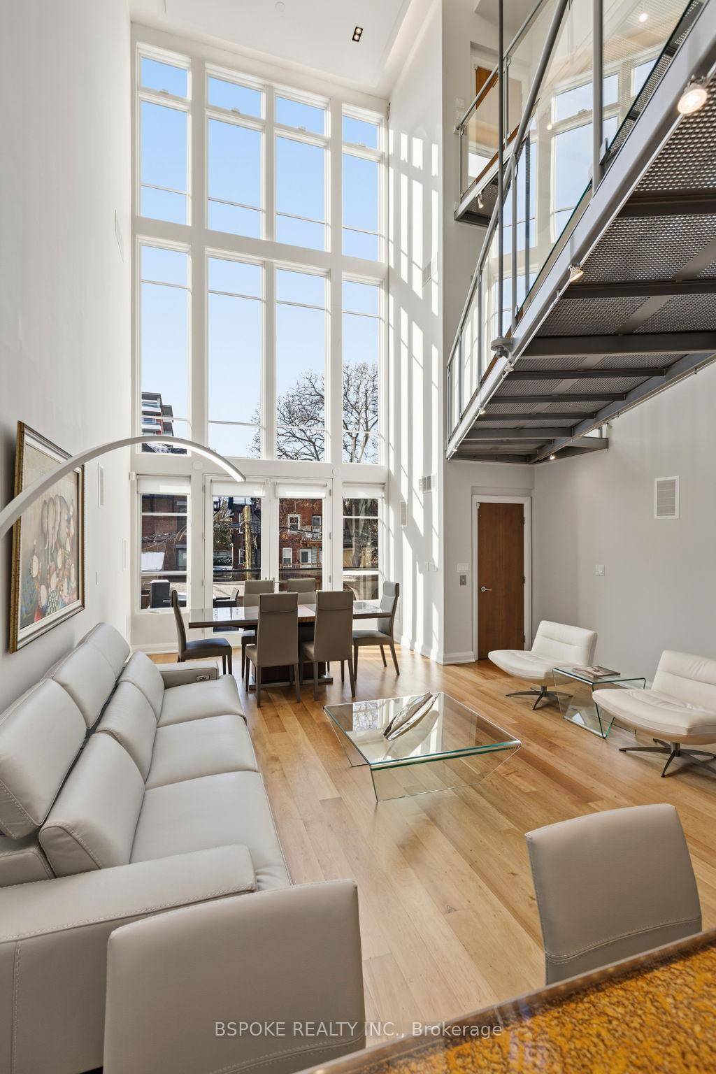 Some homes unfold as you move through them and the furnished main loft at 90 Madison Ave is one of them.