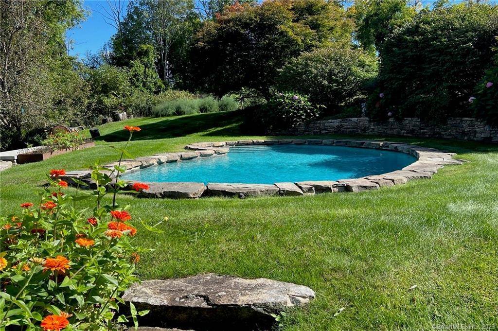 This beautiful summer rental home nestled in a charming neighborhood and surrounded by lush gardens is the perfect place to spend your summer vacation.