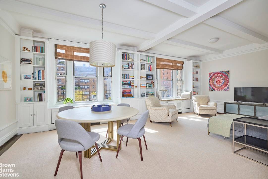 Light streams into this charming high floor south facing two bedroom plus a bonus room apartment.