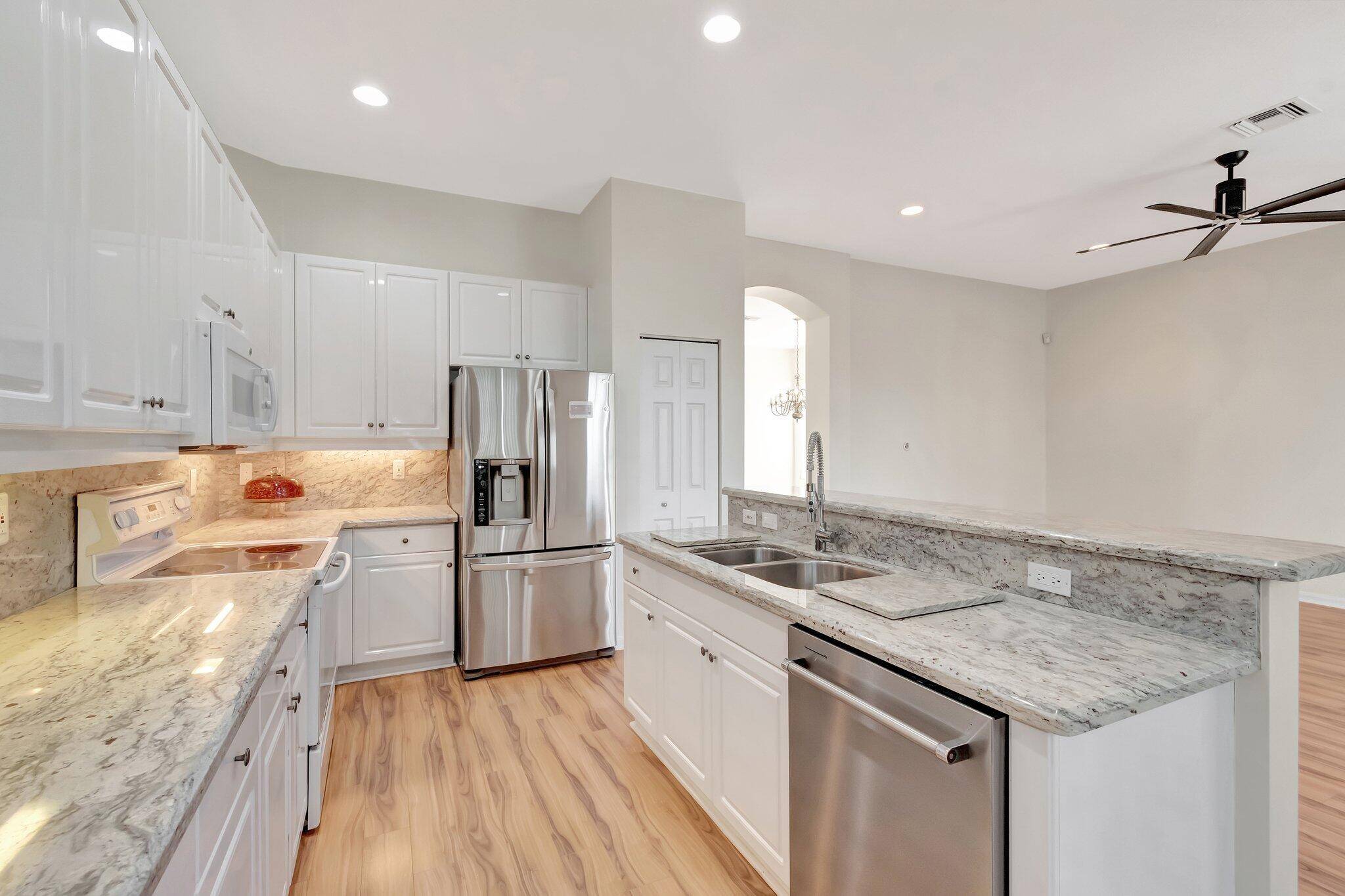 Welcome to one of the largest floor plans in the Cascades 55 community in Boynton Beach this spacious Granville model offers over 2, 000 sq ft of living space, a ...
