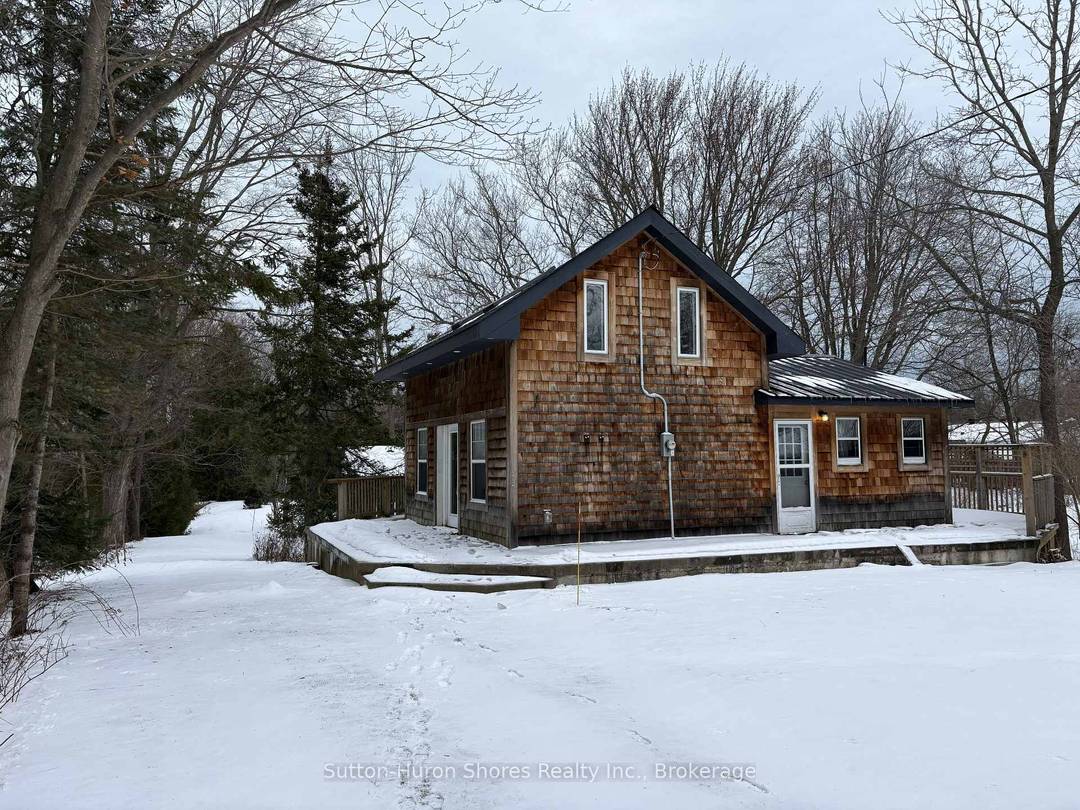 Quaint 2 bedroom, 2 bathroom cottage built in 1880, set on a spacious, treed lot overlooking a peaceful creek.