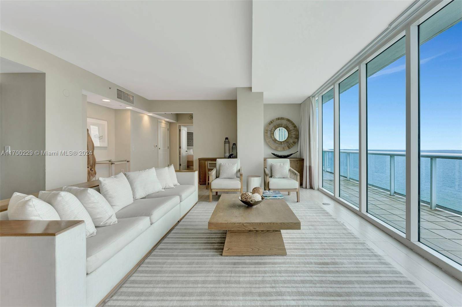 Step into this elegant two bedroom, two and a half bathroom penthouse, where an open concept living and dining space welcomes you with sophisticated design, plush furnishings, and floor to ...