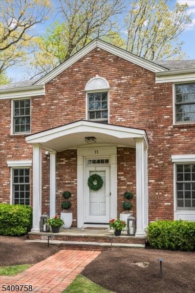 Nestled on a level 0. 62 acre lot in one of Chatham's most sought after neighborhoods, this updated 5 bedroom, 2 full and 2 half bath Colonial offers space, style, ...