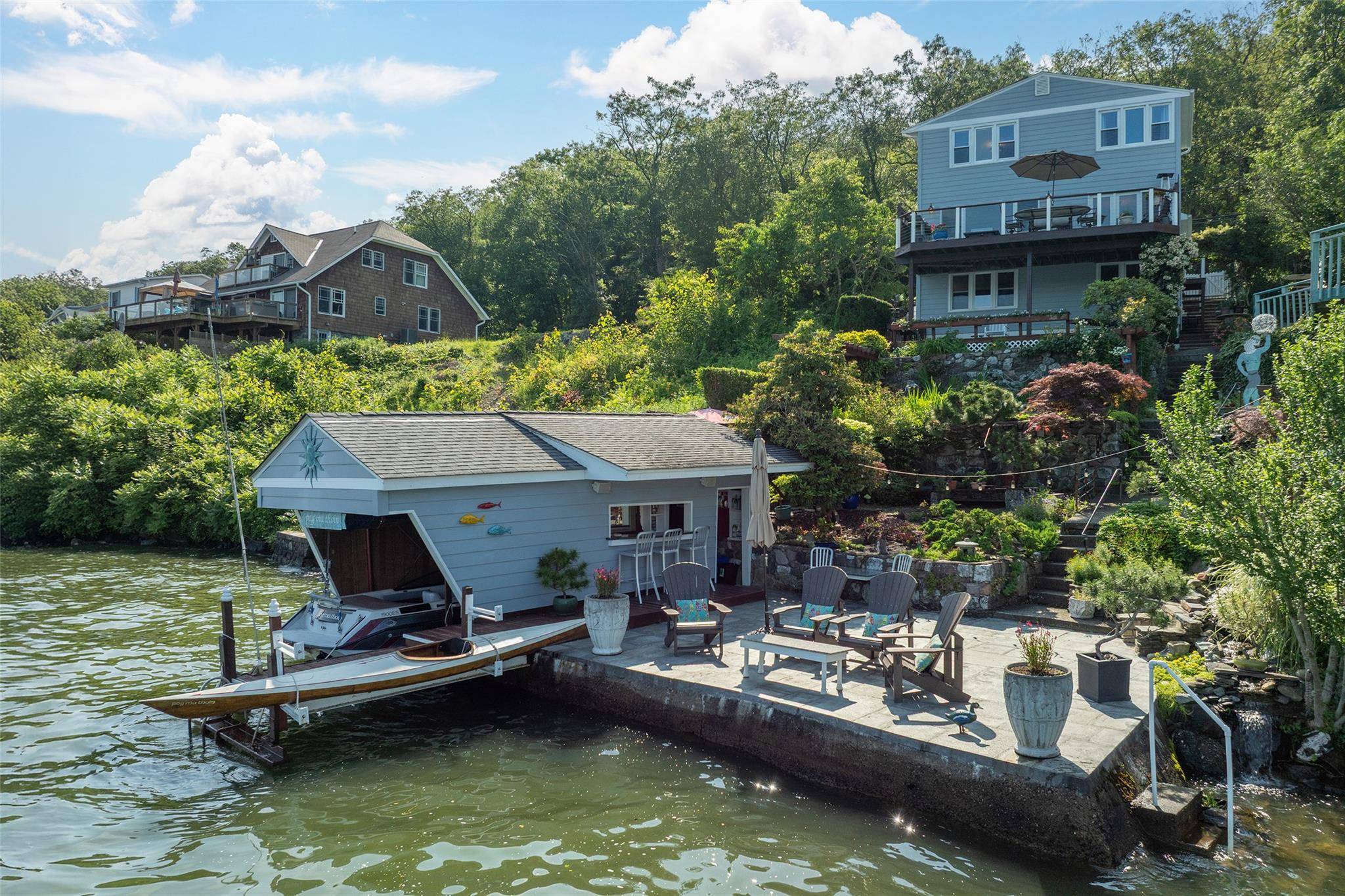 Set on the Western shore of Greenwood Lake, this terraced 4 bedroom, 2.