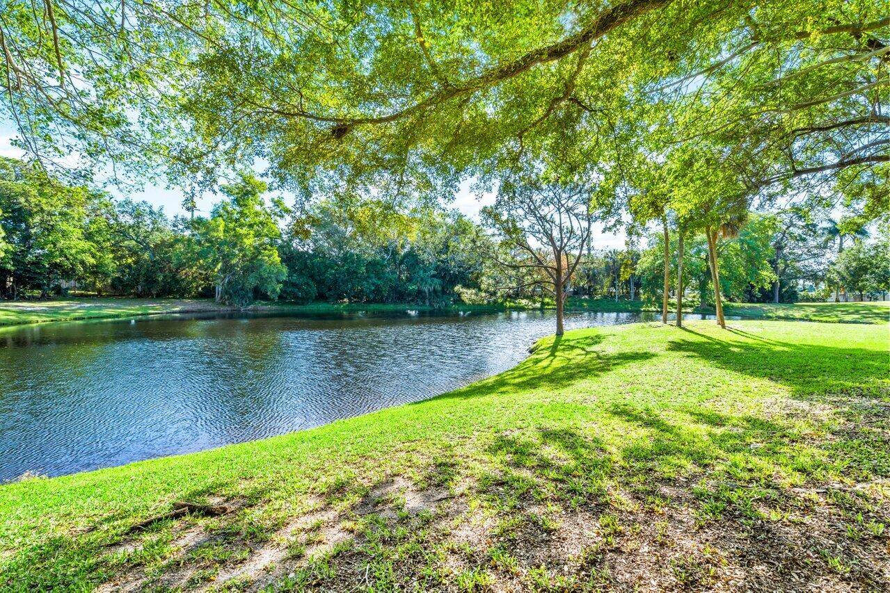 REDUCED First floor furnished lakefront garden apartment Glass enclosed patio for extra living space Loaded with closets for storage Eat In Kitchen Can lease as soon as you close New ...