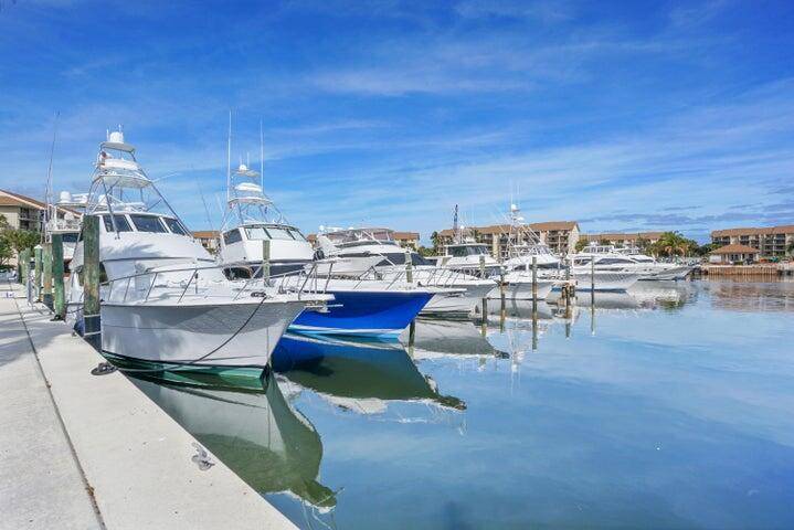 THIS DESIRABLE FIRST FLOOR UNIT, TURNKEYCONDO OFFERS A RARE OPPUTUNITY TO EMBRACE THE BEST OF JUPITER LIVING WITH STUNNING VIEWS OF THE MARINA AND WALK RIGHT OUT TO THE POOL ...