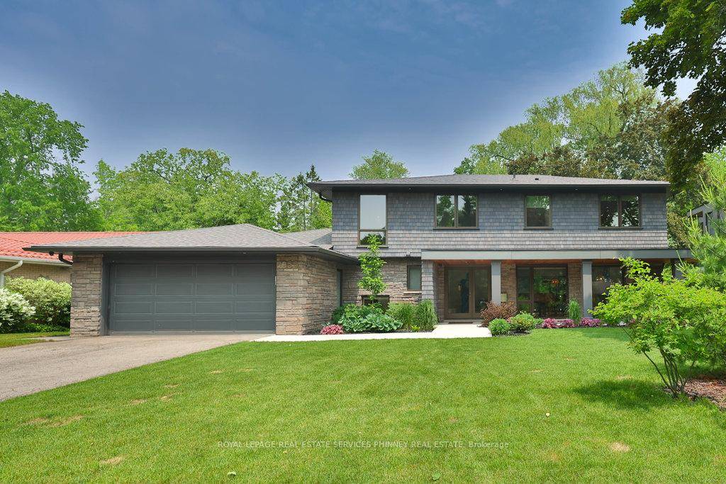 Nestled in sought after Rattray Marsh is this residence that was taken back to the studs and fully renovated in 2021 featuring a design by well known architect Gren Weis.