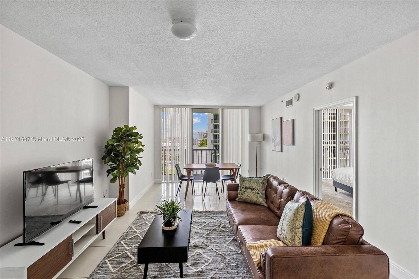 This fully furnished 1BD 1BA residence at Opera Tower offers a wall to wall balcony with Miami skyline and partial bay views.
