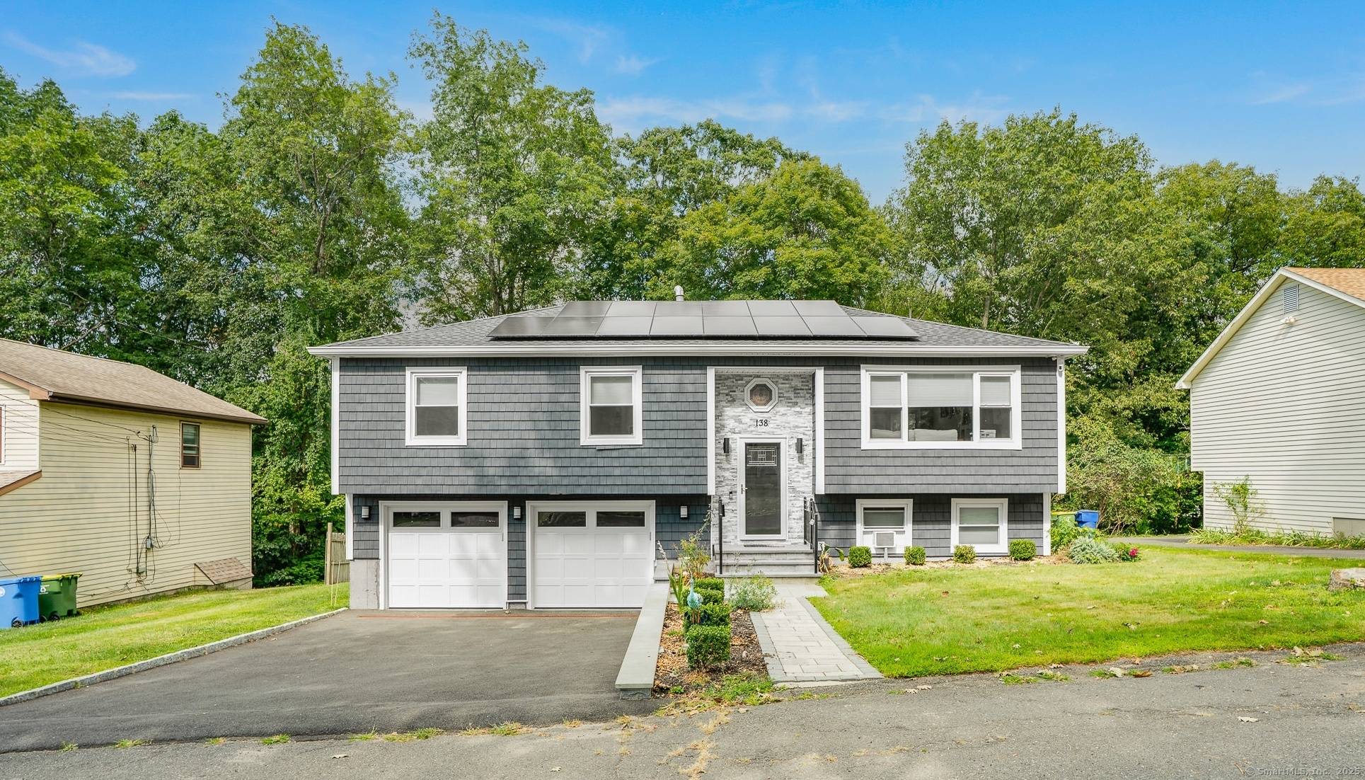 Introducing 138 Williamson Drive, Waterbury, CT, a beautifully renovated Raised Ranch style home offering modern living at its finest !