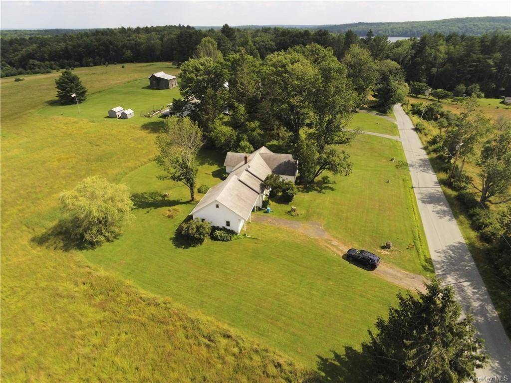 Beautiful scenic 64 acres of farmland with a combination of open fields and woods adjoining the Lake Superior State Park of more than 1400 acres.
