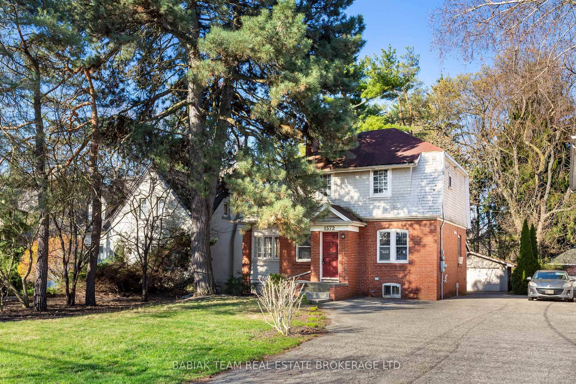 Nestled on an expansive lot overlooking the manicured greens of the premier Islington Golf course, this three bedroom century old home blends historic charm with unmatched potential.