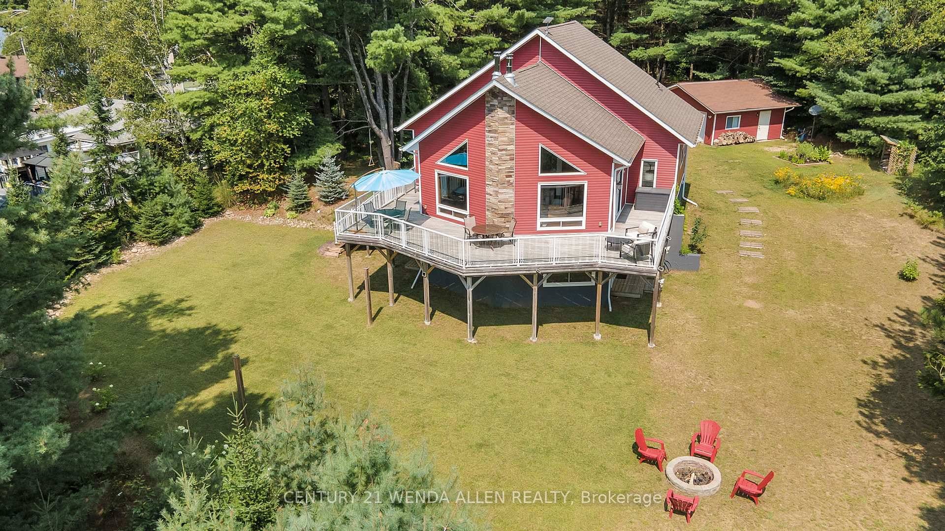 STUNNNING 3 bedroom home or cottage on quiet spring fed Stimears lake, a non motor lake for your quiet enjoyment !