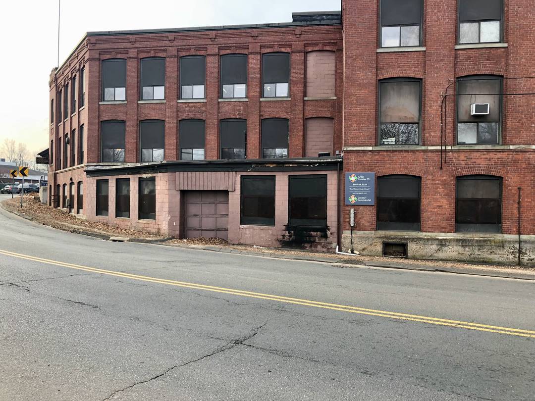 Old School Industrial Building located in a perfect spot just south of on off ramp of Route 72 with quick connections to Route 84.