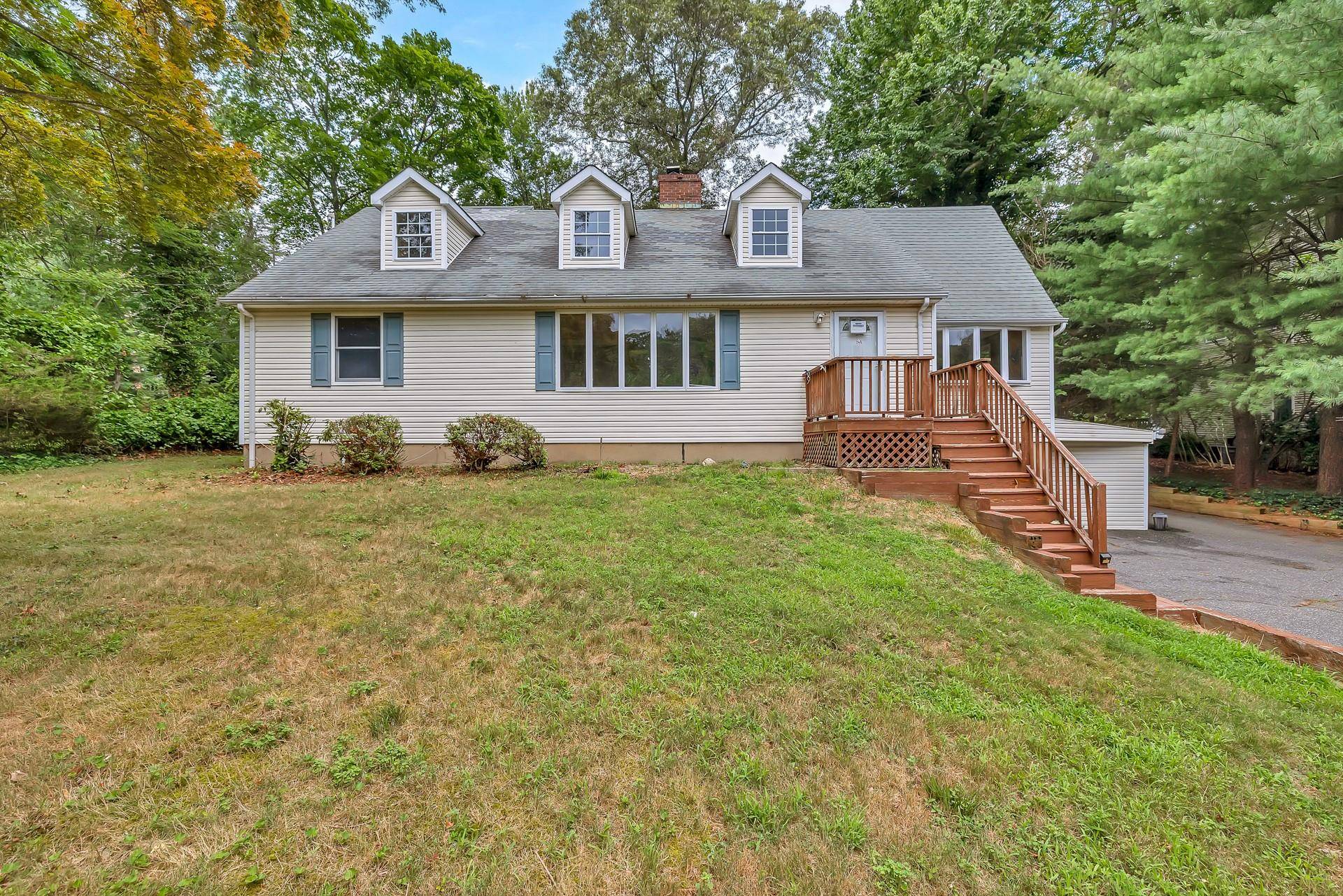 Welcome to 297 Woodbury Road, Huntington, NY a spacious and versatile Expanded Cape offering endless possibilities !