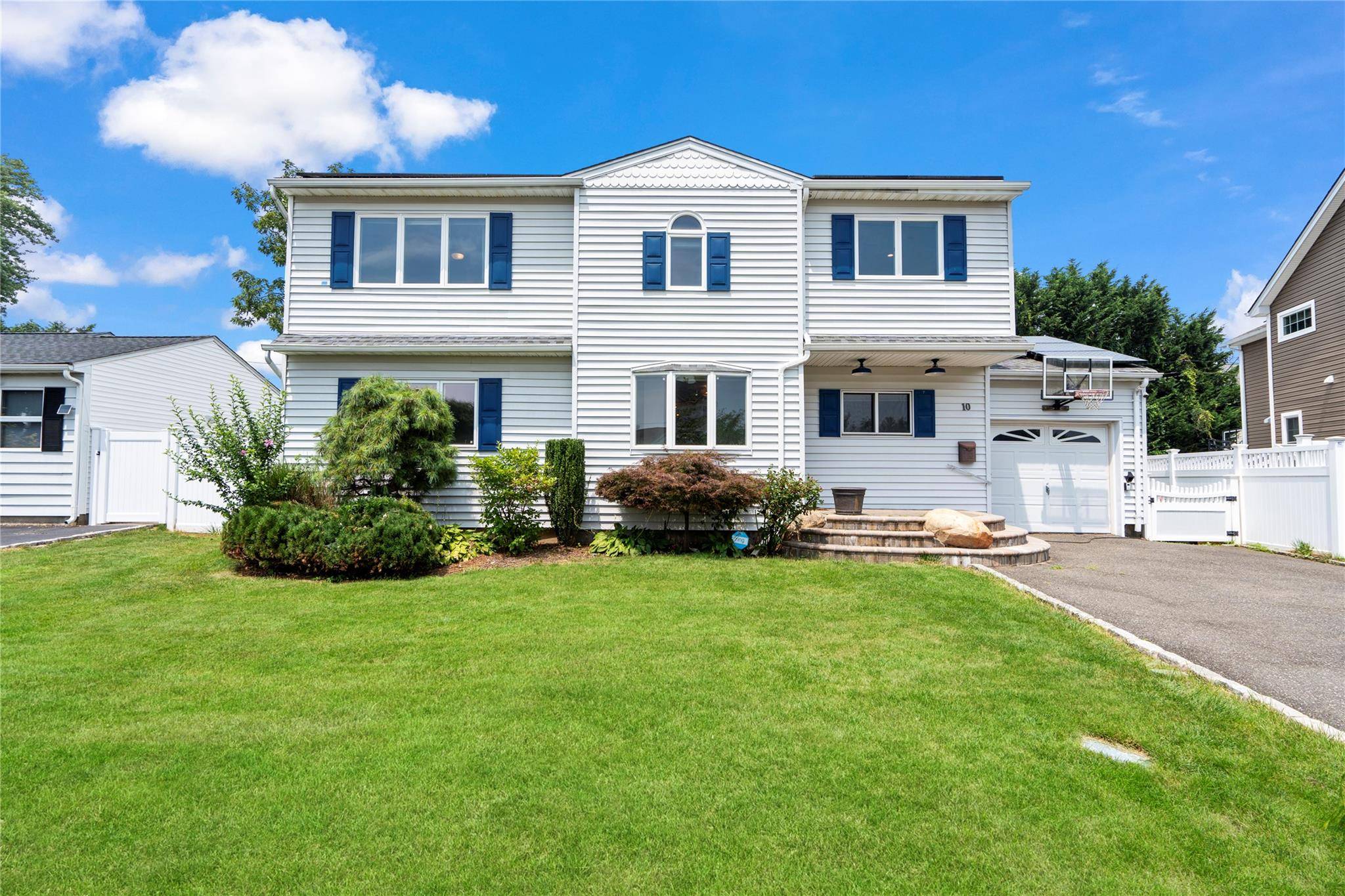 Nestled in a Desirable Mid Block Location, This Meticulously Maintained 5 Bedroom, 2 Bath Home Offers the Perfect Blend Of Modern Updates and Classic Charm.