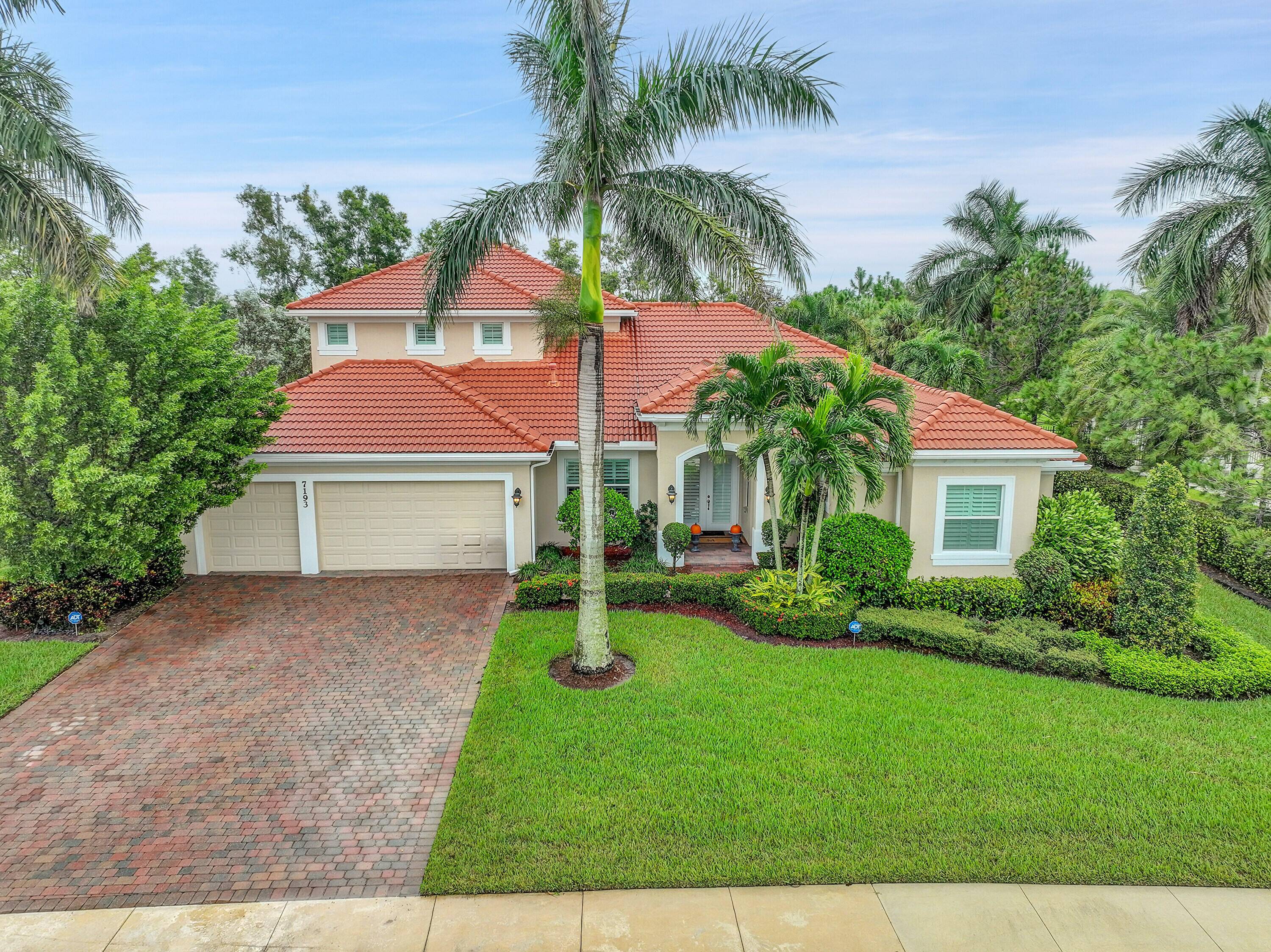 Tres Belle in Stuart offers this STUNNING 5 br,, plus den, 4 bath Pool home nestled on a 1 2 acre Corner lot !