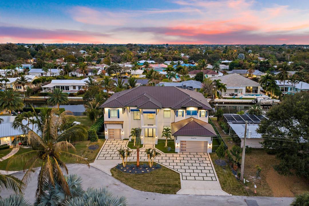 Newly completed in February of 2026, this waterfront estate home has it all.