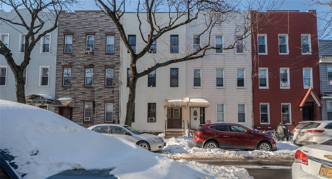 Turnkey 3 family house in the heart of Ridgewood featuring 6 rooms over 6 rooms over owners 5 room apartment with large backyard over a full partially finished basement.