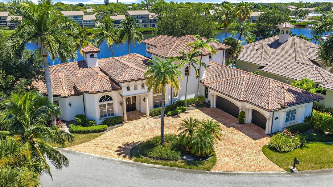 Nestled in the prestigious gated community of Jupiter River Estates known to locals as the Islands of Jupiter this extraordinary estate offers unmatched waterfront living.