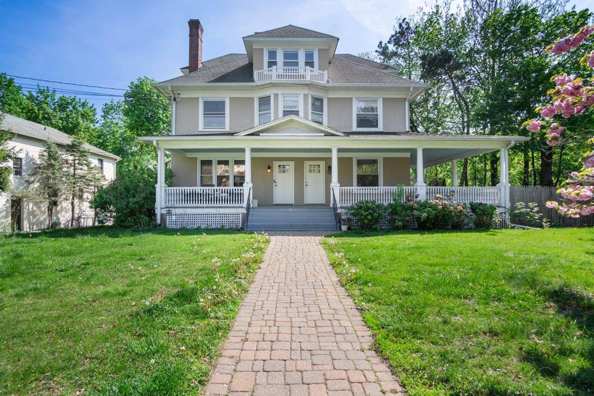 Welcome to 21 Cornelison Avenue A Rare, Expansive Income Producing Gem in the Heart of Nyack Step into what feels like your own private estate this striking colonial style triplex ...