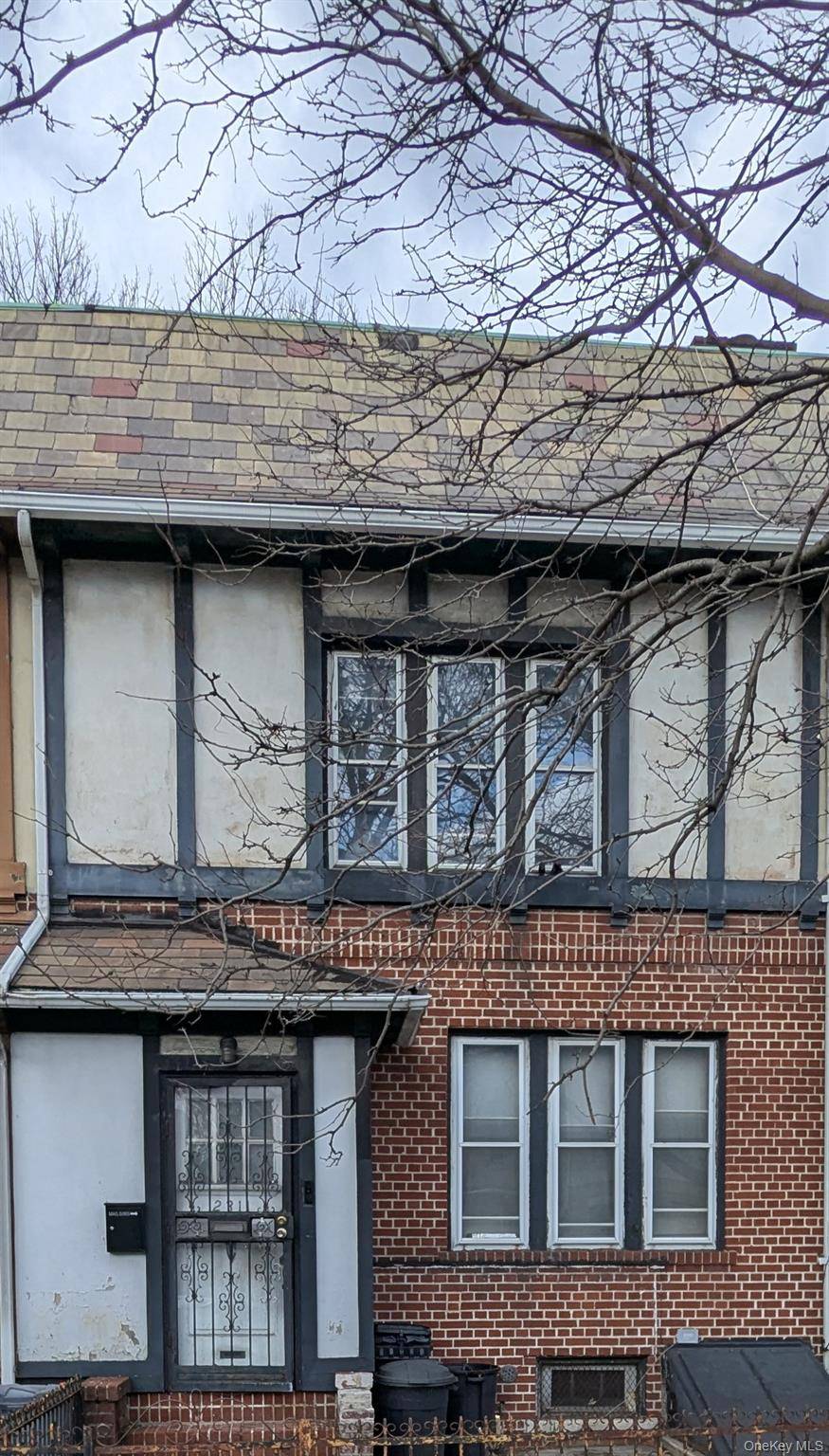 Opportunity awaits to transform this classic Tudor gem into your dream home !