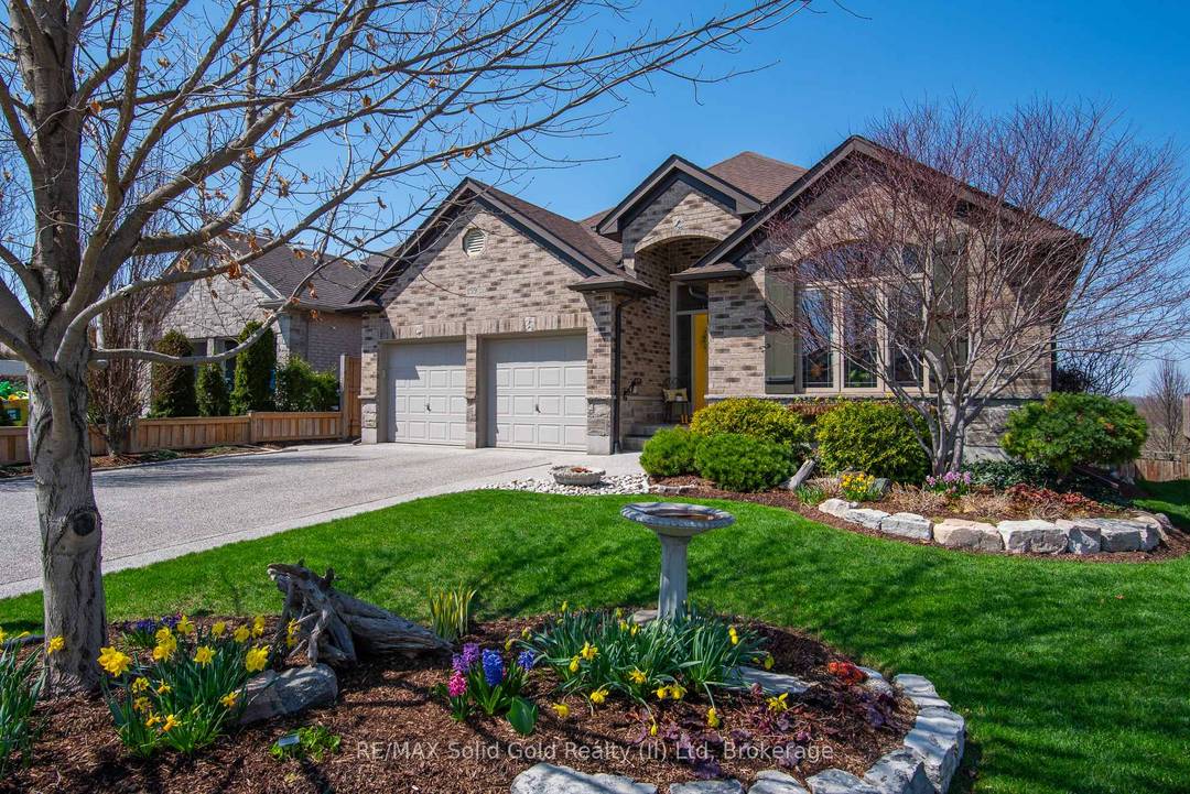 This exceptional 3 1 bedroom all brick bungalow with a walk out basement and no rear neighbours offers a perfect blend of timeless design and thoughtful craftsmanship.