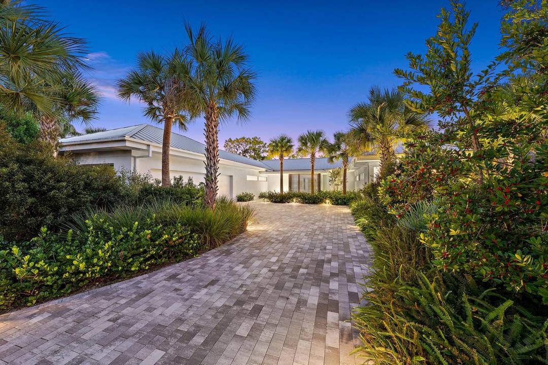 Custom built in 2023 Experience contemporary luxury and serene living in this architectural masterpiece nestled within one of Palm Beach Gardens' most exclusive gated enclaves, Old Marsh Golf Club.