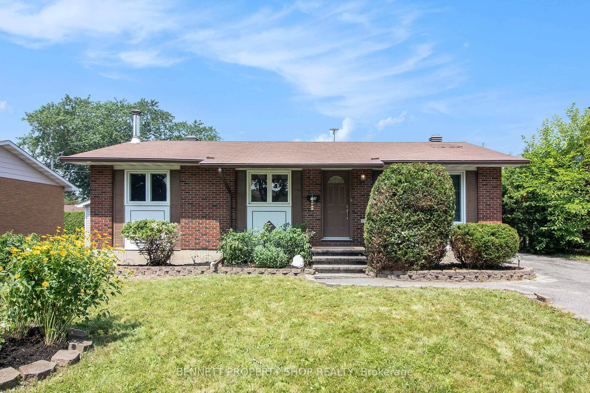 This spacious all brick bungalow is centrally located in the family friendly Queenwood Heights neighbourhood within walking distance to schools.