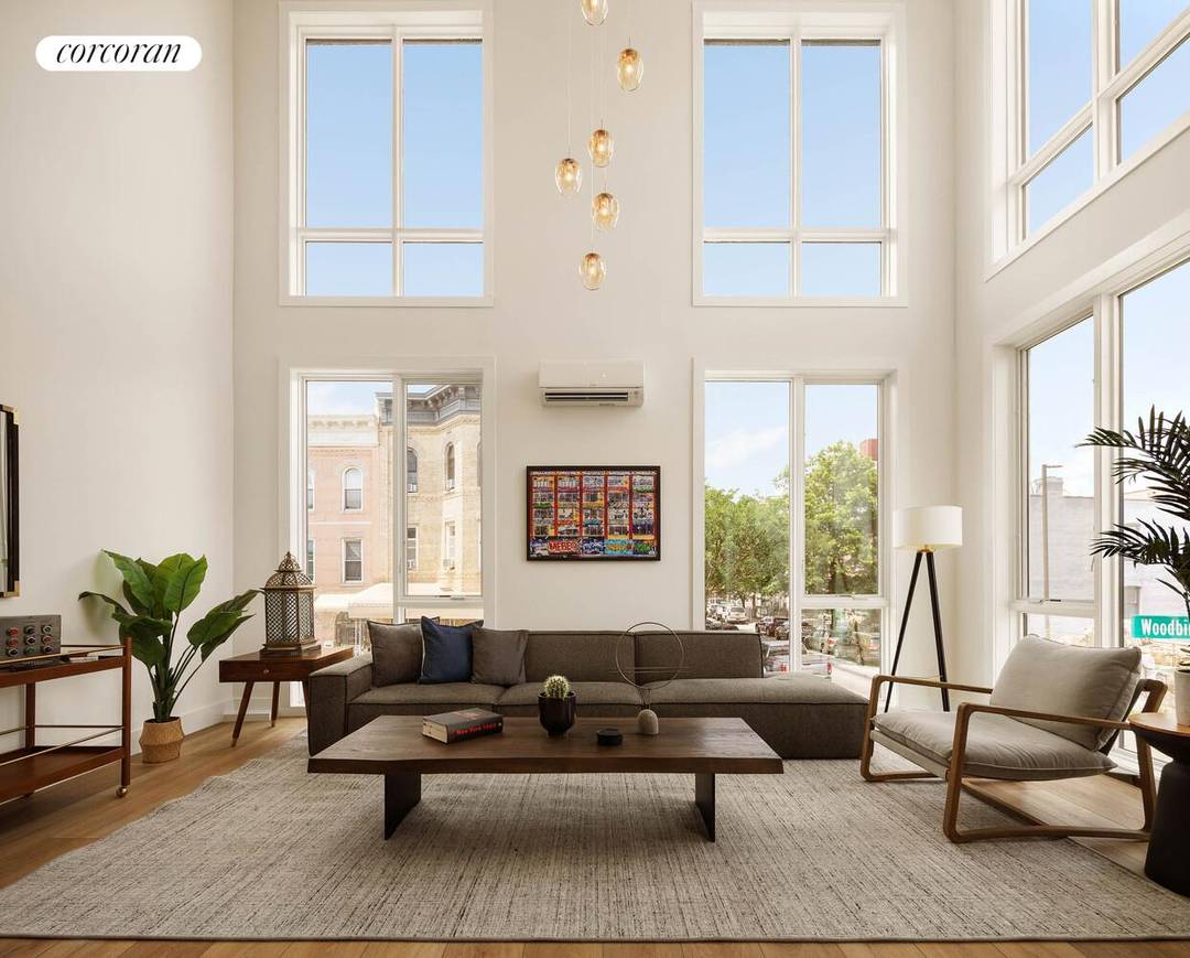 Luxury living reaches new heights with these two expansive single family townhouse condominiums, perfectly situated on the vibrant border of Bushwick and Ridgewood.
