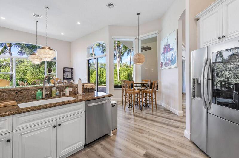 Stunning home in one of the most sought after private gated neighborhoods right next to the WEF show grounds.