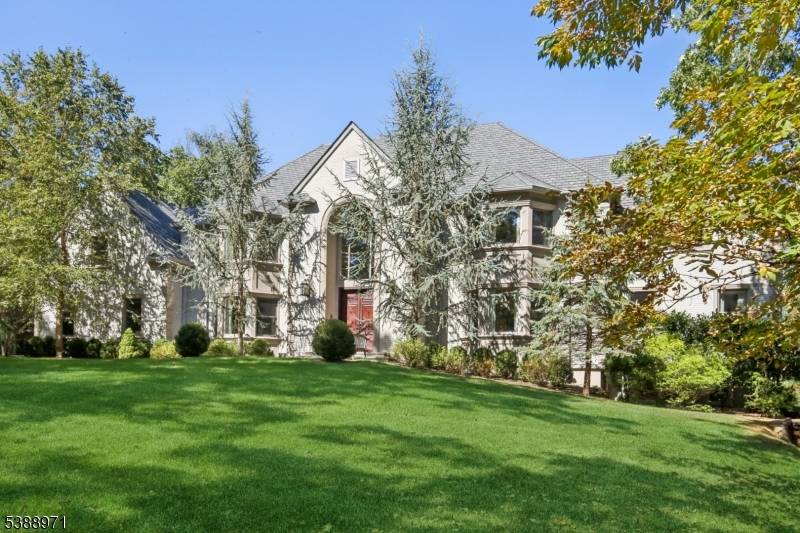 Set high in the Watchung Mountains, this remarkable 2015 custom built residence combines architectural sophistication with sustainable innovation.