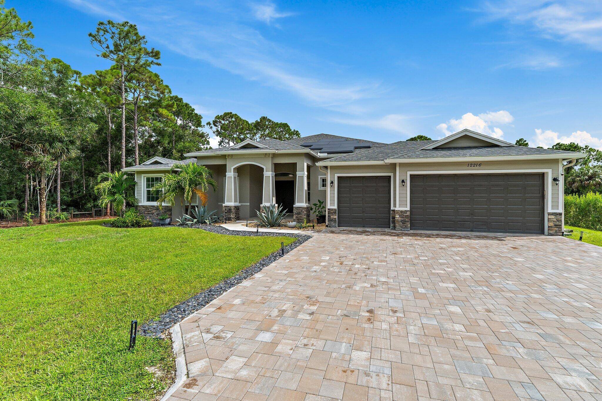 Jupiter Farms pool home on 1.