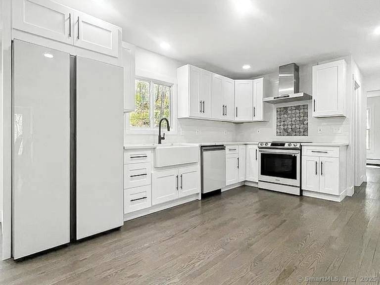 Gorgeous Dutch Colonial fully remodeled in the heart of Fairfield County !