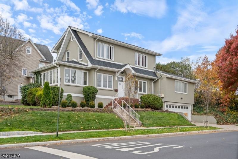Welcome to this beautifully renovated 4 bedroom, 3 bath Colonial that seamlessly blends timeless charm with modern updates.