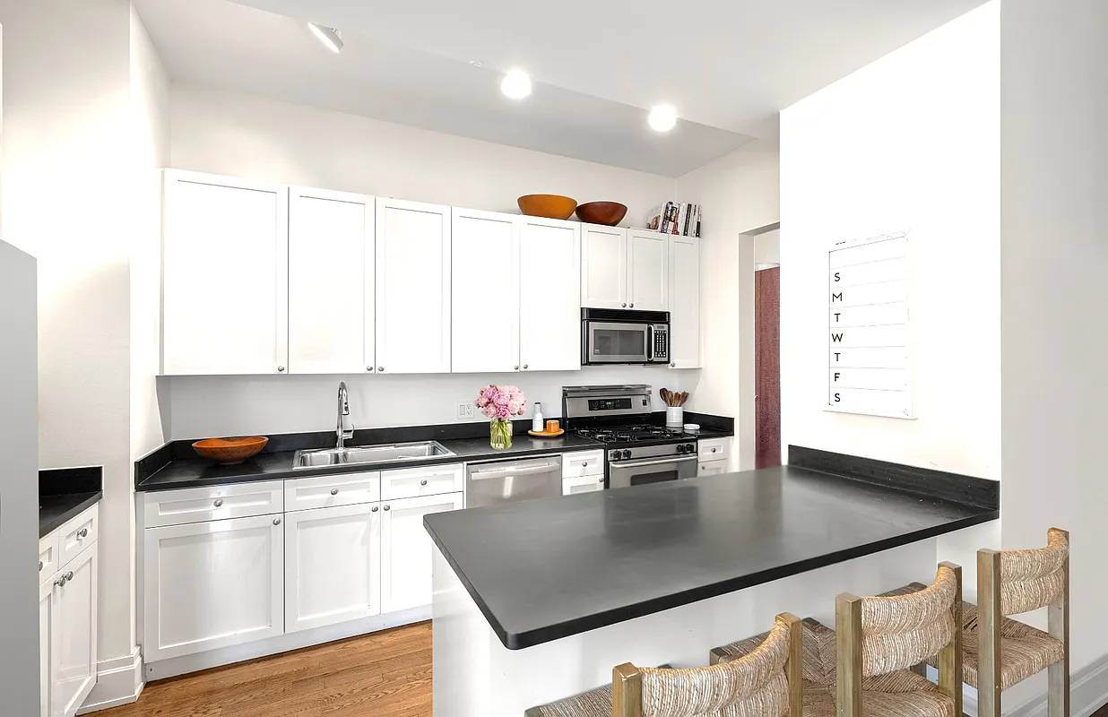 Enjoy a quintessential Chelsea loft lifestyle in this expansive sun splashed corner home.