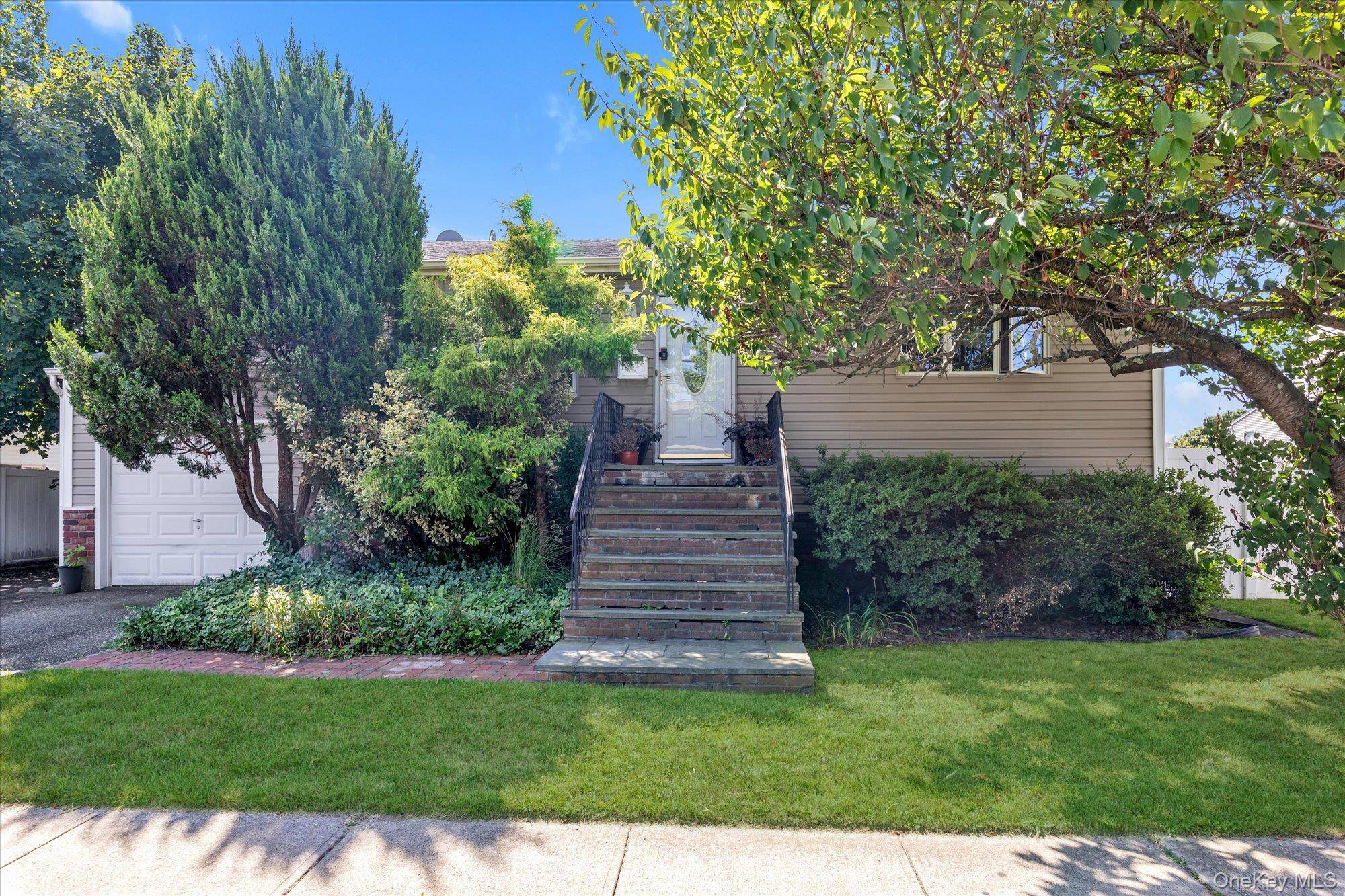 3 Bed, 2 Full Bath Ranch with Half Finished Walk Out Basement.
