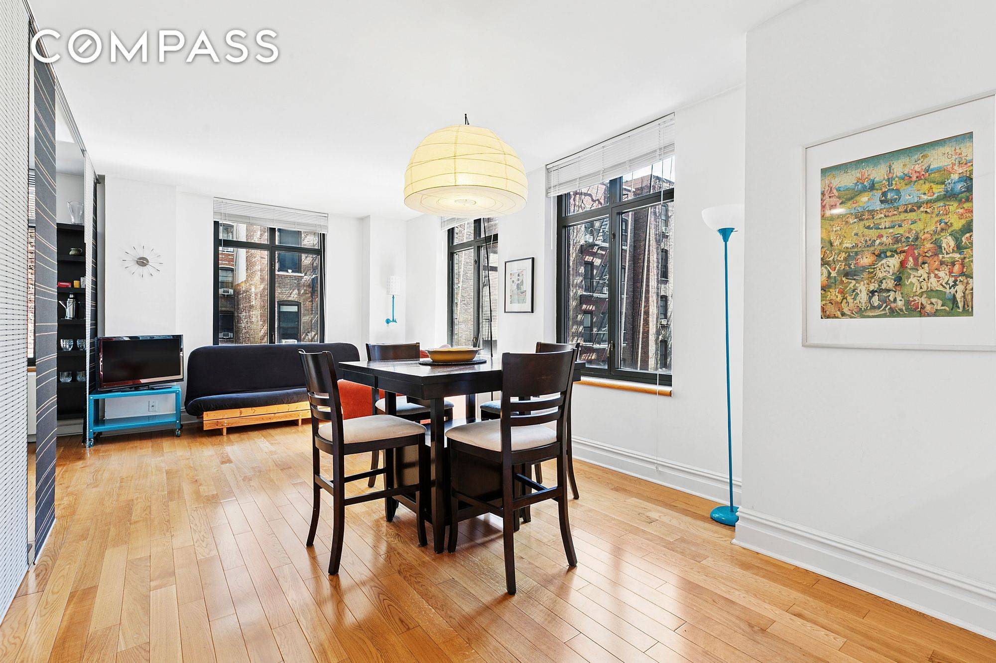 Furnished alcove studio with washer and dryer in top Riverside Drive Condominium.